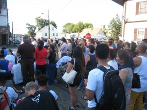 A large group of neighbors & community members gathered